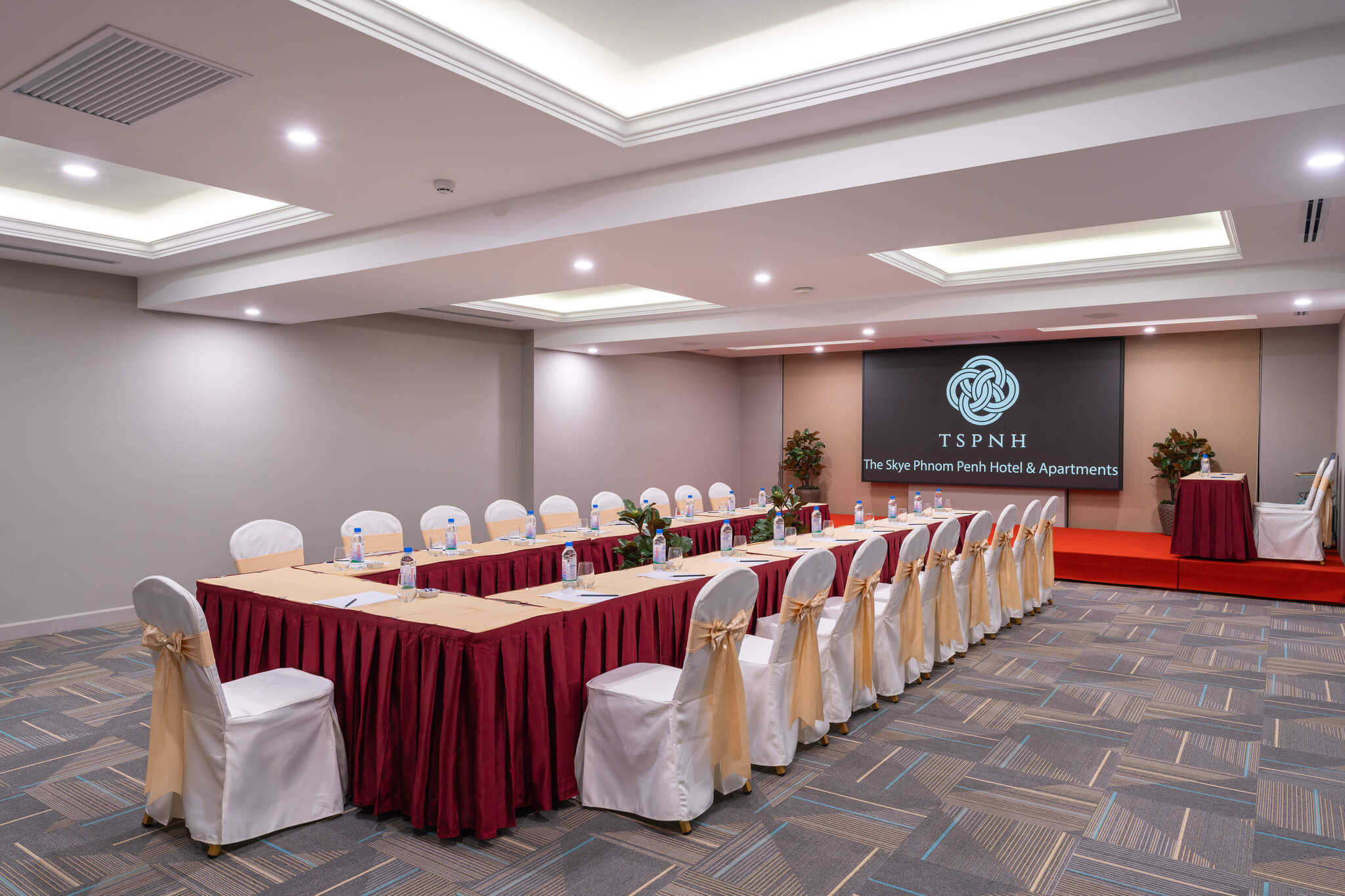 Host your next social event at The Skye Phnom Penh Hotel, Cambodia: stunning meeting room with elegant decor and flexible seating arrangements.